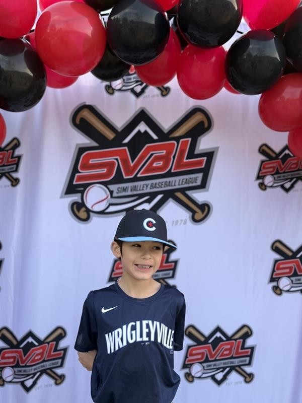 Weston with baseball hat