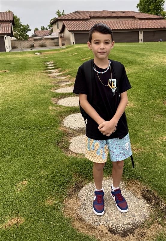 Weston standing on a path