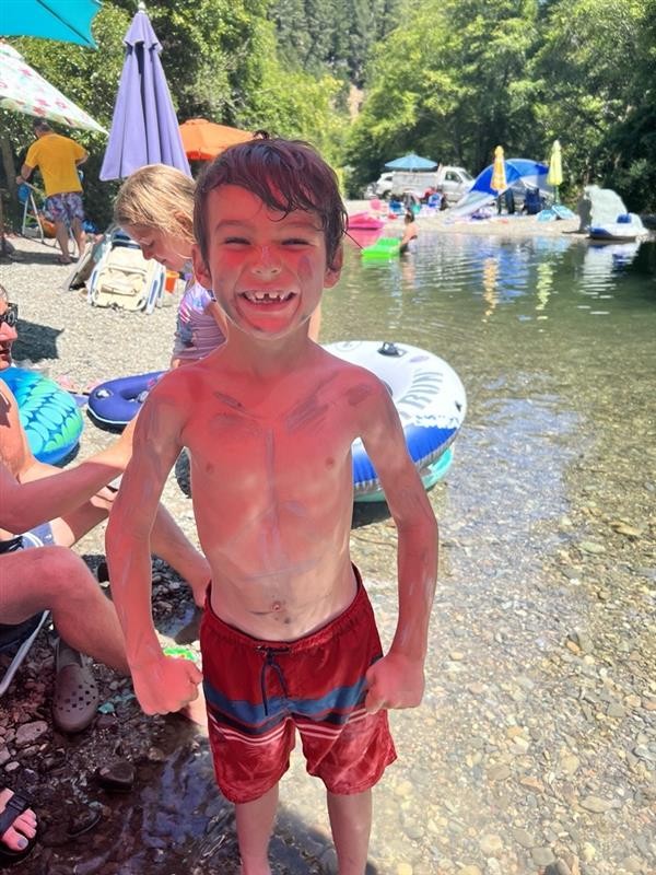 Weston in red bathing suit